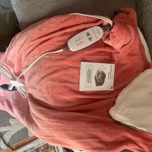 CALMING COZY DELUXE MASSAGING HEATING WRAP; CORAL IN COLOR.